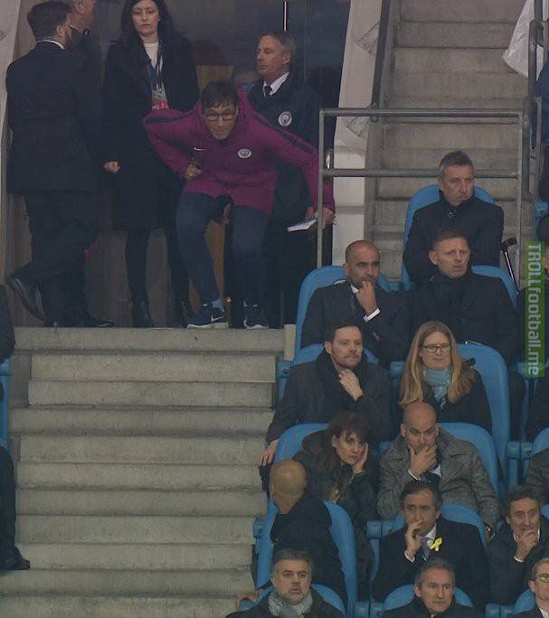 Pep Guardiola here, presumably asking his assistant why so many people who look like Pep Guardiola are all sat so close to each other ..