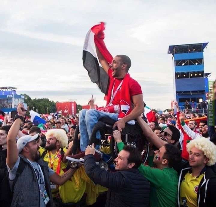 Colombian fans and Mexican fans lift up an Egyptian fan in a wheelchair so he can watch his country play. What a picture 😍  (TW/Carolina_Moran)