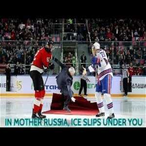 Jose Mourinho slips on red carpet at KHL ice hockey game.