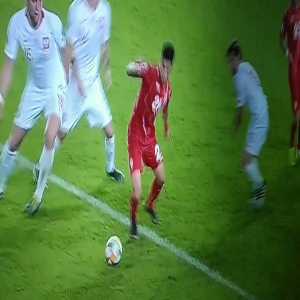 Grzegorz Krychowiak (POL) faking getting hit in the groin after his teammate Jan Bednarek's handball thus successfully preventing a penalty [MKD - POL, Euro Qualifiers]