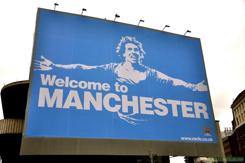 On This Day 10 Years Ago: Carlos Tevez signed for Man City and this famous 'Welcome to Manchester' billboard was unveiled