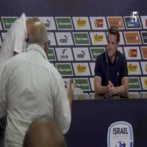Older Israeli fan interrupts NT manager Andi Herzog's press conference with broken English tirade.