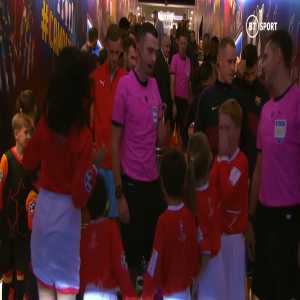 These young mascots couldn't contain their excitement at seeing Lionel Messi in the flesh in the Nou Camp tunnel before Barcelona's Champions League match against Slavia Prague.