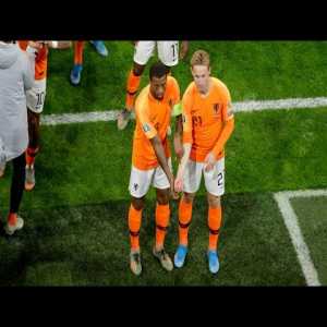Georginio Wijnaldum celebrates his goal with an anti-racism message alongside Frankie de Jong.