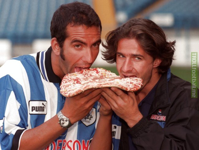 As there's Going To Be No Matches For Awhile Please Enjoy This Very 90's Picture of Sheffield Wednesday Announcing The Signings of Italian Duo Paolo Di Canio and Benite Carbone By Having Them Pose With An Uncooked Pizza