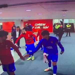 Antoine Griezmann walking out with Joao Felix as his mascot.