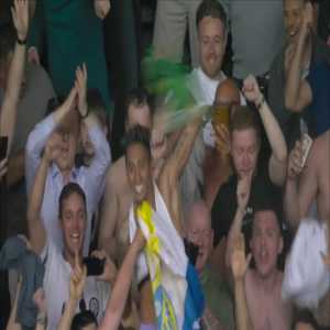 Raphinha celebrating in the stands with the Leeds fans