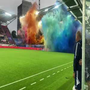 [Vålerenga Fotball] Supporters of the Oslo club Vålerenga lighting flares in rainbow colors after Friday nights terrorist attack on a gay bar in Oslo