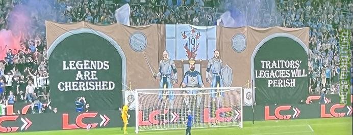 Cool tifo in the Sydney Derby. Milos Ninkovic (number 10 jersey burning) joined Western Sydney Wanderers this season after becoming club legend for Sydney FC and playing for them for 7 seasons. Also pictured in the tifo are club legends Redmayne, Brosque and Grant