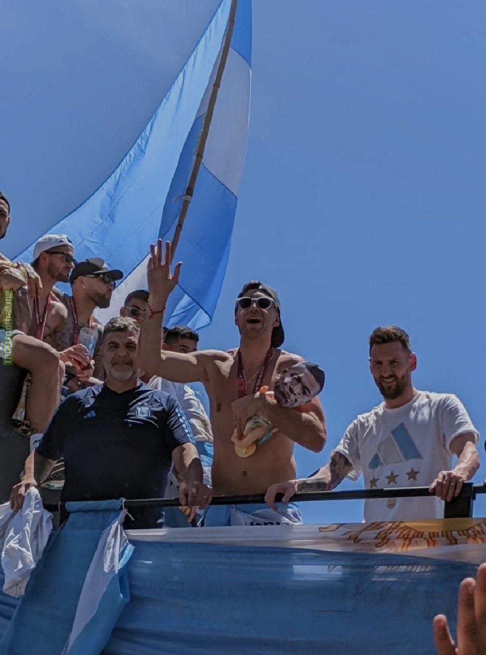 Emiliano Martinez at the Argentine champions parade, celebrating with a baby doll with Mbappé’s face that was thrown to him by fans
