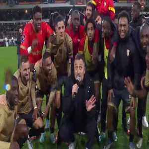 RC Lens manager Frank Haise leading the celebrations after the win against PSG