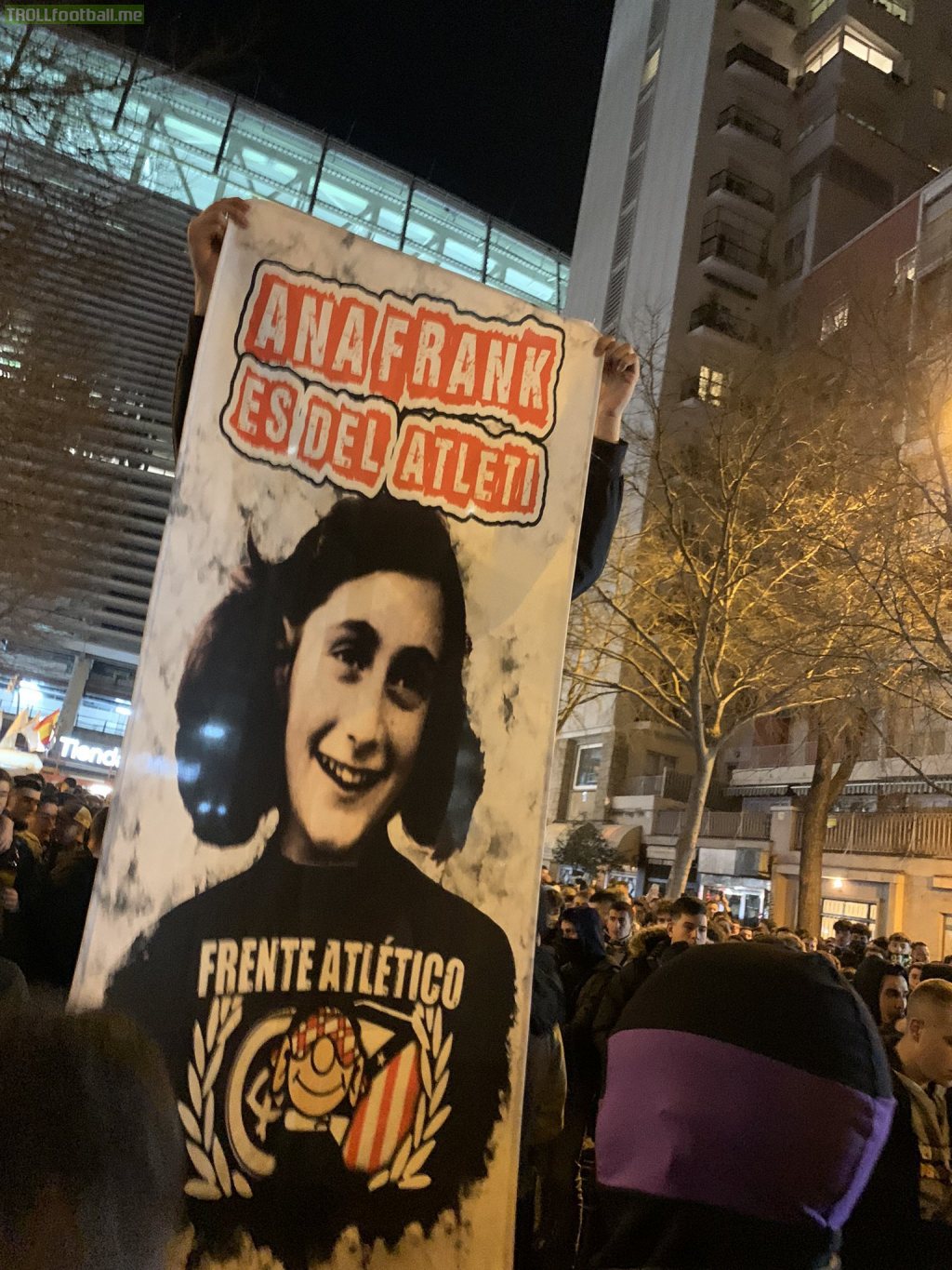 Real Madrid fans with this poster before the game against Atlético in Bernabéu which says "Anne Frank is from Atleti"