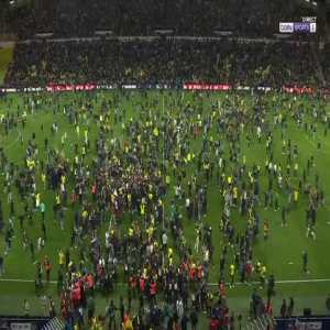 Final whistle and pitch invasion after Nantes qualifcation for the Coupe de France final