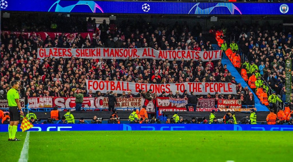Bayern Munich fans have held up a banner calling for the Glazers to leave MUFC: "Glazers, Sheikh Mansour and all autocrats out, football belongs to the people."