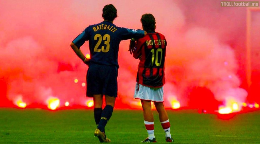 18 years ago today, this iconic photo of Materazzi and Rui Costa was taken during the CL QFs in which flares were thrown onto the pitch following some controversial refereeing decisions against Inter which saw them forfeit the match, and Milan go through to the semifinals.