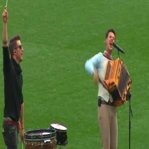 Half time show during Südtirol vs Genoa with an accordion and a drum